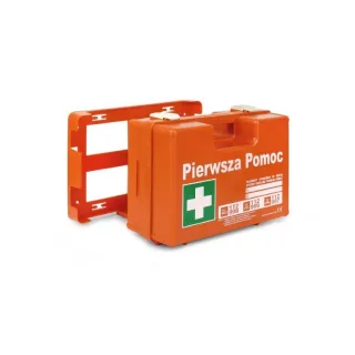 Pomarańczowa apteczka zakładowa z tworzywa sztucznego z białym napisem "Pierwsza Pomoc" i zielonym krzyżem. W tle widoczny jest uchwyt montażowy do ściany.